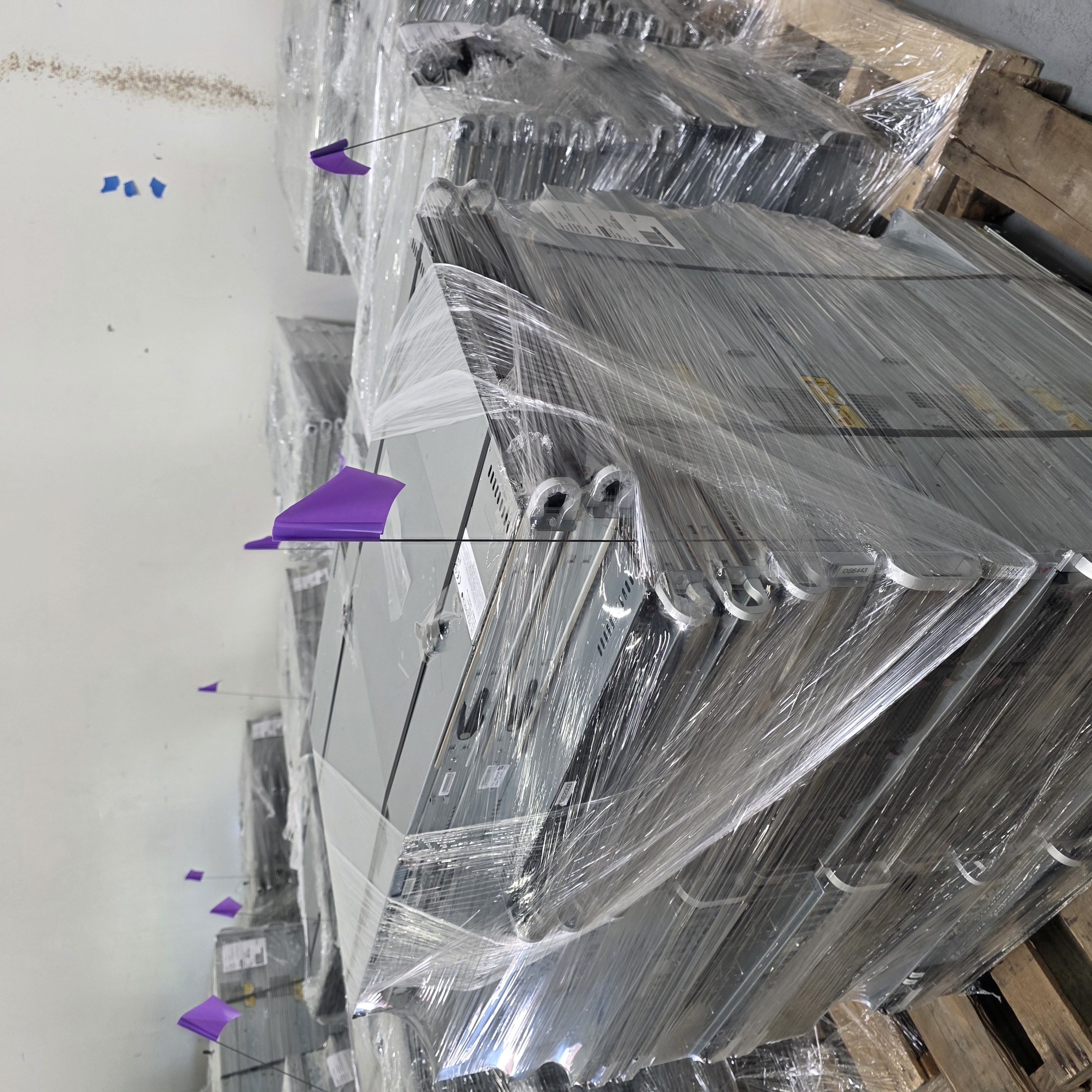 Palletized servers awaiting certified data erasure at SouthEast Computer Recyclers